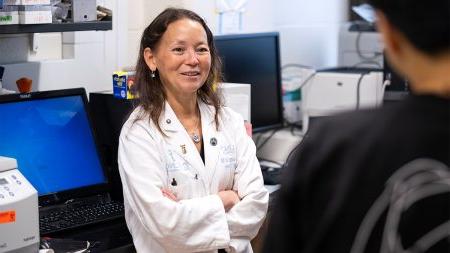 A scientist in a lab coat.